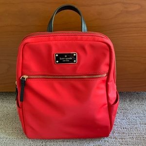 Kate Spade red backpack, zipper exterior pocket